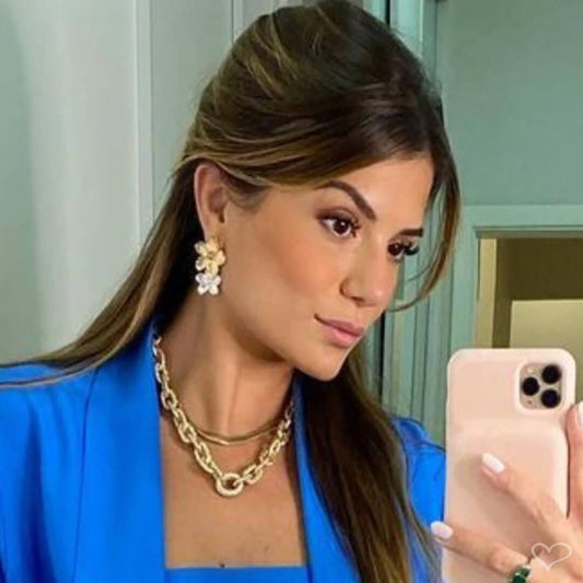 Brinco Piuka Flor Amarílis Dourado e Prata