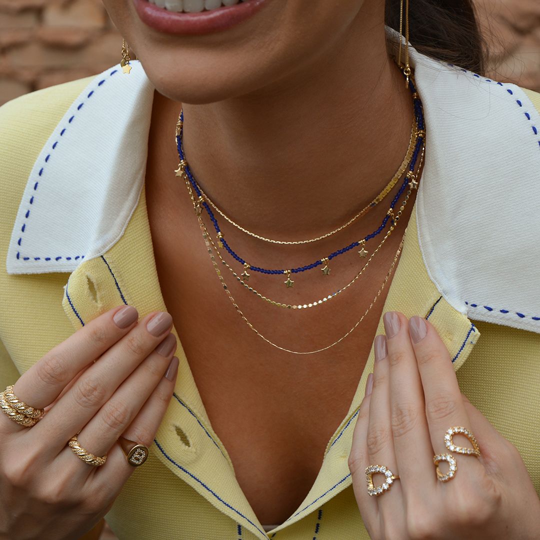 Choker Auria Mini Estrelas Zircônias Safira Folheada a Ouro 18k