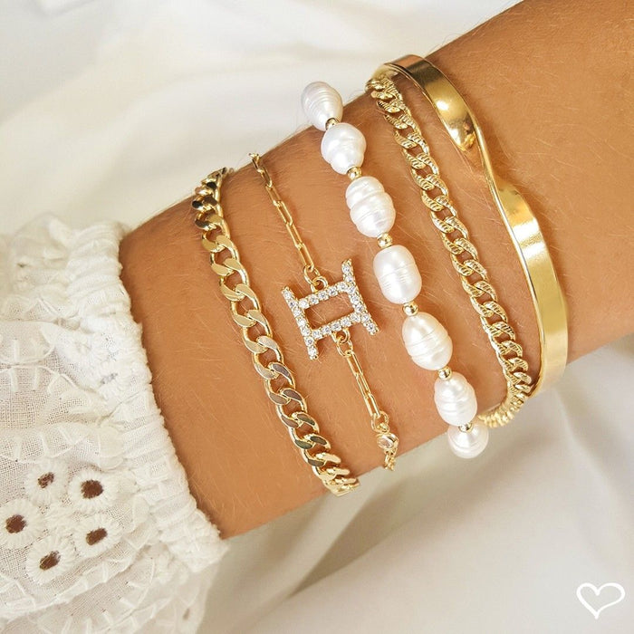 Bracelete Feminino Folheado a Ouro 18k Torcido Caly