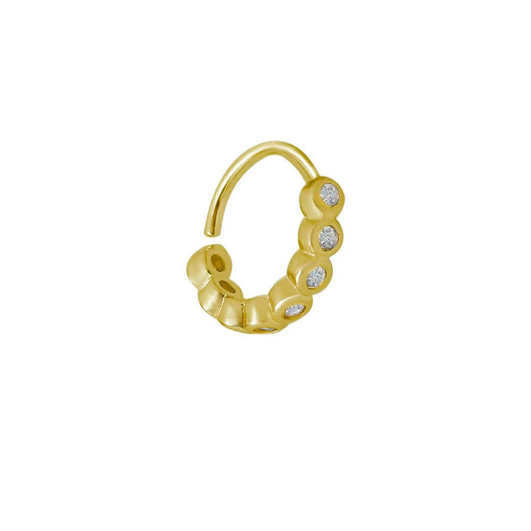 Piercing de Furo Piuka Argola Torção 8mm Manu Pontos de Luz Zircônias Dourado