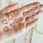 Piercing de Furo Piuka Argola Torção 8mm Daisy Zircônias Dourado