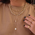 Escapulário Piuka Sagrado Coração de Jesus e Nossa Senhora do Carmo Madrepérola Folheado a Ouro 18k