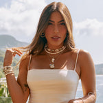 Brinco de Argola Tubo Torcido Camila G Folheado a Ouro 18k - Piuka