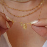 Colar Mini Medalha Nossa Senhora Aparecida Mini Cruz Zircônias Folheado a Ouro 18k - Piuka