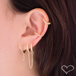 Piercing de Furo Piuka Jenna Argola Torção 8mm Zircônias Dourado - Piuka